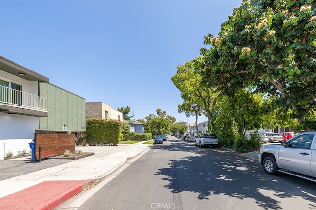 3337 S Durango Ave, Los Angeles, CA 90034 - view of asphalt street featuring a residential view, curbs, and sidewalks