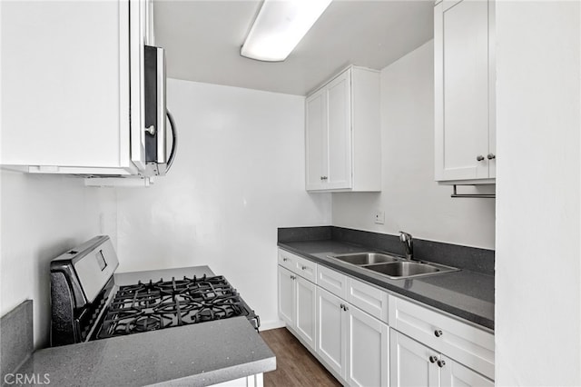 3337 S Durango Ave, Los Angeles, CA 90034 - kitchen featuring a sink, stainless steel appliances, white cabinets, and dark wood-style floors