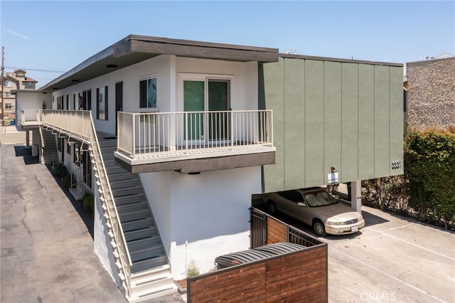 3337 S Durango Ave, Los Angeles, CA 90034 - view of home's exterior with a balcony and stucco siding