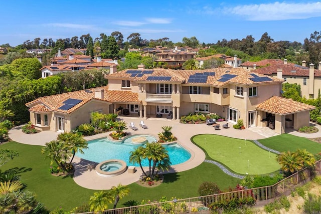 5106 Meadows Del Mar, San Diego, CA 92130 - view of pool featuring a putting green, a pool with connected hot tub, a patio area, and a residential view