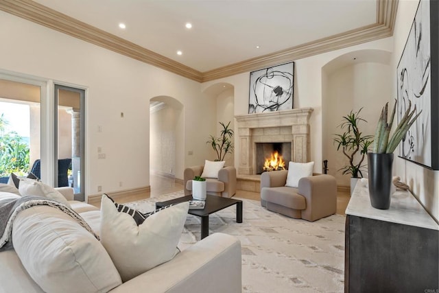 5106 Meadows Del Mar, San Diego, CA 92130 - living area featuring arched walkways, ornamental molding, a high end fireplace, and recessed lighting