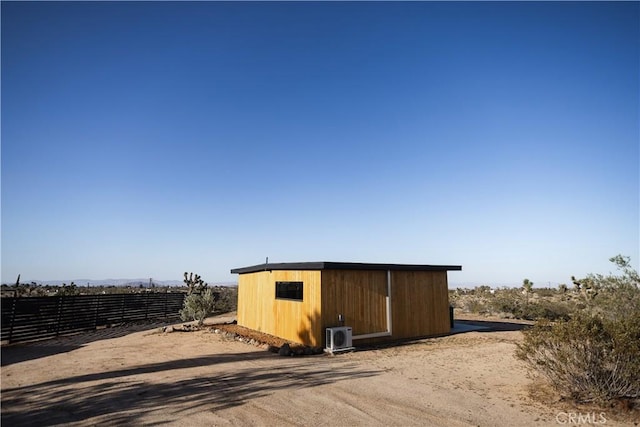 3977 Sage Ave, Yucca Valley, CA 92284 - view of shed featuring a rural view