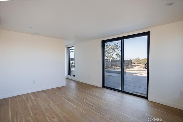 3977 Sage Ave, Yucca Valley, CA 92284 - spare room with light wood-style floors and baseboards