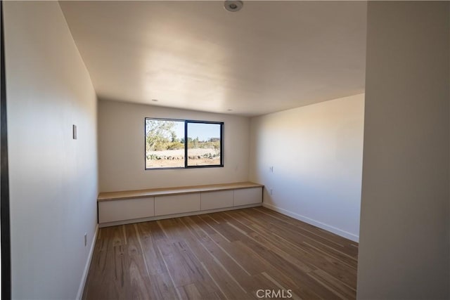 3977 Sage Ave, Yucca Valley, CA 92284 - spare room with wood finished floors and baseboards