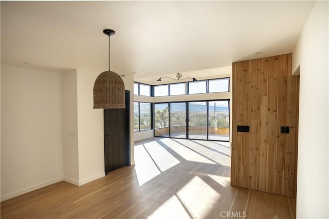3977 Sage Ave, Yucca Valley, CA 92284 - unfurnished living room with wood finished floors