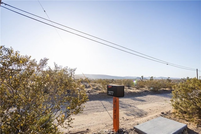 3977 Sage Ave, Yucca Valley, CA 92284 - view of street with a mountain view and a view of countryside