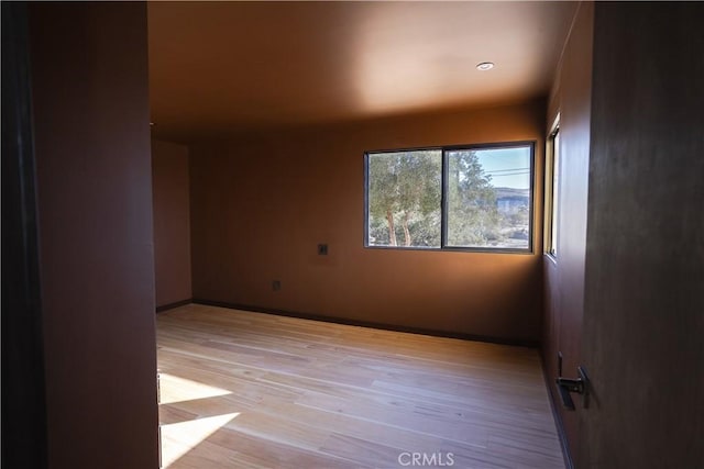 3977 Sage Ave, Yucca Valley, CA 92284 - unfurnished room featuring light wood-style floors and baseboards