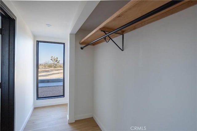 3977 Sage Ave, Yucca Valley, CA 92284 - spacious closet with light wood finished floors