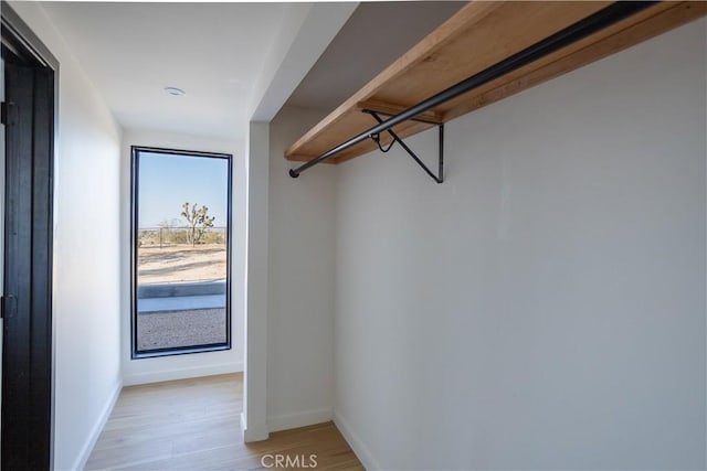 3977 Sage Ave, Yucca Valley, CA 92284 - walk in closet featuring light wood finished floors