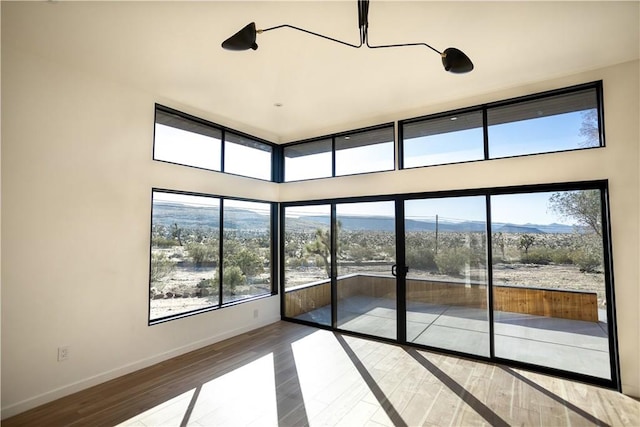 3977 Sage Ave, Yucca Valley, CA 92284 - unfurnished sunroom featuring a mountain view