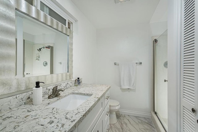 3630 S Vista Campana Unit 22, Oceanside, CA 92057 - bathroom featuring a stall shower, vanity, toilet, baseboards, and marble finish flooring