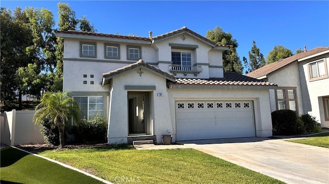 762 Saint James Dr, Corona, CA 92882 - mediterranean / spanish home with concrete driveway, stucco siding, a tiled roof, and a garage