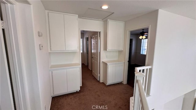 762 Saint James Dr, Corona, CA 92882 - kitchen featuring carpet, light countertops, and white cabinetry
