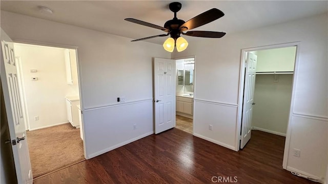 762 Saint James Dr, Corona, CA 92882 - unfurnished bedroom featuring a spacious closet, wood finished floors, a closet, ensuite bathroom, and baseboards