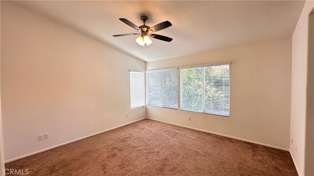 762 Saint James Dr, Corona, CA 92882 - spare room featuring carpet floors, vaulted ceiling, baseboards, and ceiling fan