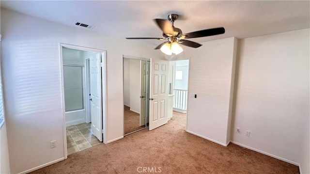762 Saint James Dr, Corona, CA 92882 - unfurnished bedroom with light carpet, connected bathroom, baseboards, and ceiling fan
