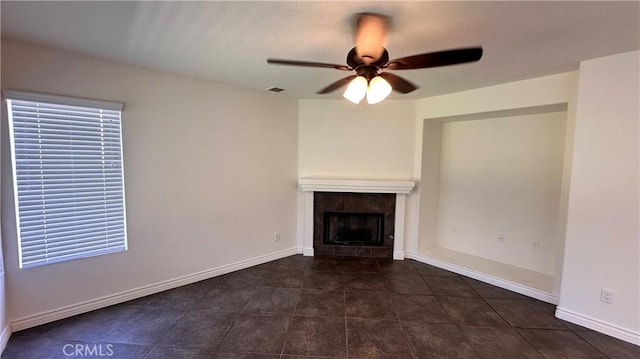 762 Saint James Dr, Corona, CA 92882 - unfurnished living room featuring ceiling fan, a tiled fireplace, tile patterned flooring, and baseboards