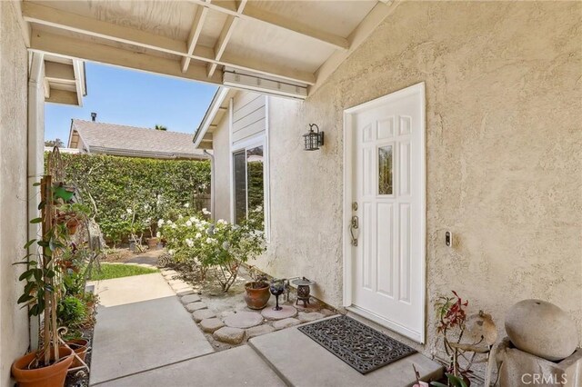27385 Osuna, Mission Viejo, CA 92691 - doorway to property with stucco siding