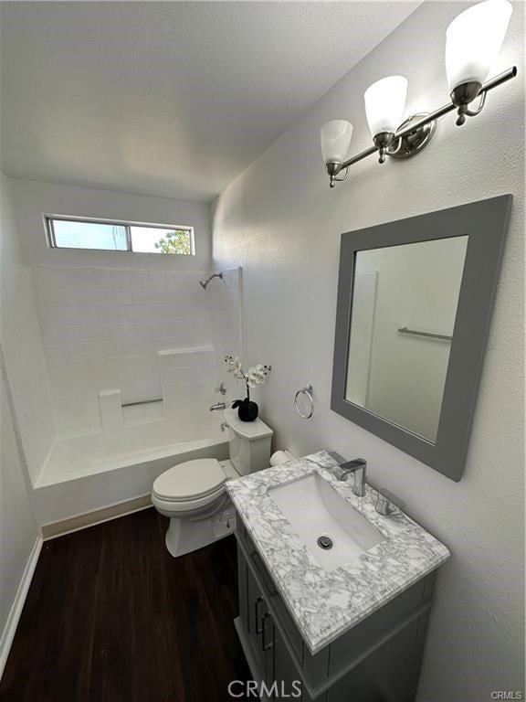 3030 Twincreek Ave, Palmdale, CA 93551 - full bathroom featuring vanity, wood finished floors, shower / bathtub combination, and toilet