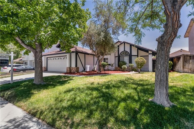 3030 Twincreek Ave, Palmdale, CA 93551 - view of front of property with a garage, stucco siding, concrete driveway, and stone siding