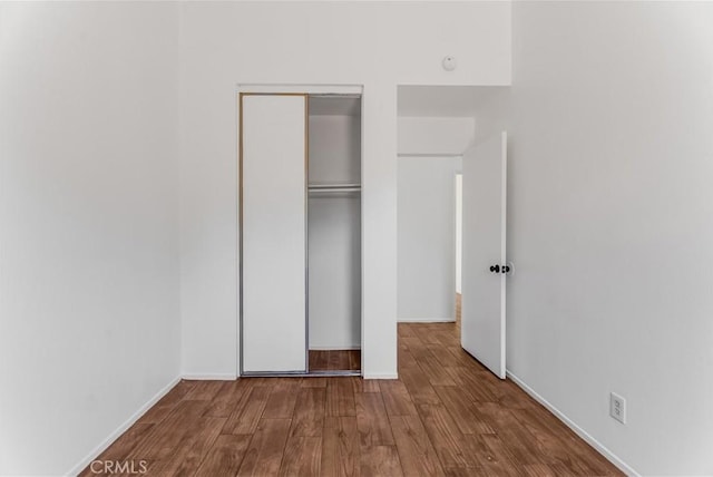 3030 Twincreek Ave, Palmdale, CA 93551 - unfurnished bedroom with a closet and wood finished floors
