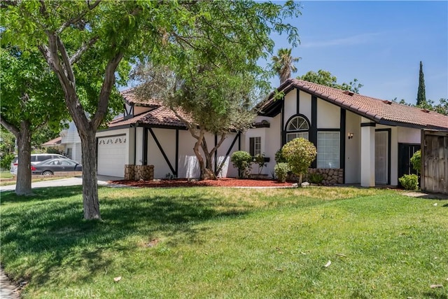 3030 Twincreek Ave, Palmdale, CA 93551 - view of front facade with an attached garage, stucco siding, a front lawn, and a tile roof