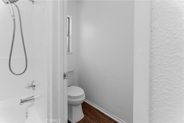 3030 Twincreek Ave, Palmdale, CA 93551 - full bath with wood finished floors and bathtub / shower combination