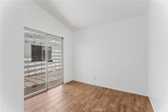 3030 Twincreek Ave, Palmdale, CA 93551 - empty room with wood finished floors and lofted ceiling