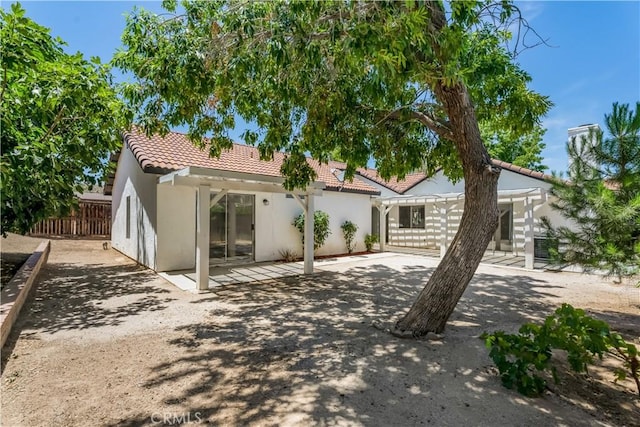 3030 Twincreek Ave, Palmdale, CA 93551 - rear view of house with a tile roof, a patio, and stucco siding