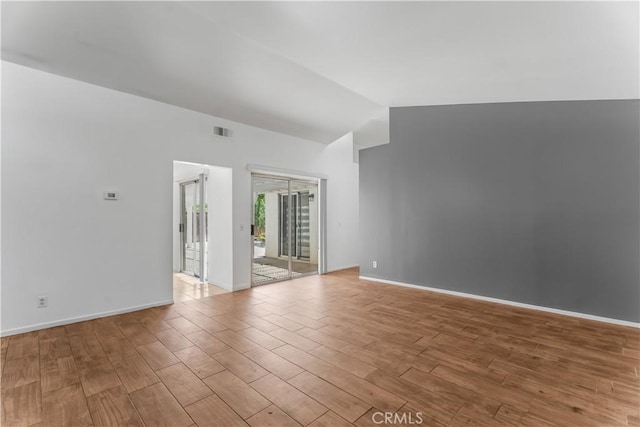 3030 Twincreek Ave, Palmdale, CA 93551 - unfurnished room featuring lofted ceiling and light wood-style floors