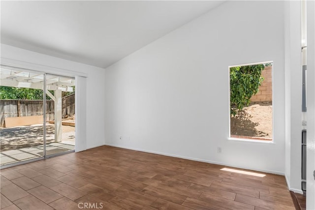 3030 Twincreek Ave, Palmdale, CA 93551 - empty room featuring wood finished floors and vaulted ceiling