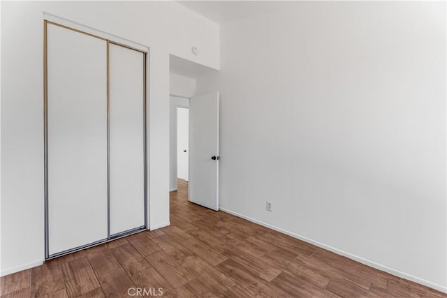 3030 Twincreek Ave, Palmdale, CA 93551 - unfurnished bedroom featuring wood finished floors and a closet