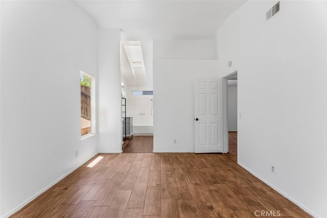 3030 Twincreek Ave, Palmdale, CA 93551 - spare room with wood finished floors and a towering ceiling