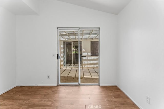 3030 Twincreek Ave, Palmdale, CA 93551 - spare room with wood finished floors and vaulted ceiling