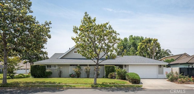 17442 Parker Dr, Tustin, CA 92780 - view of front of home featuring an attached garage and driveway
