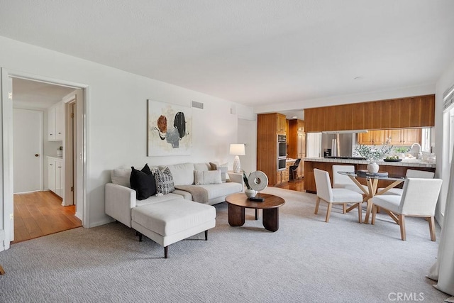 17442 Parker Dr, Tustin, CA 92780 - living room featuring light carpet