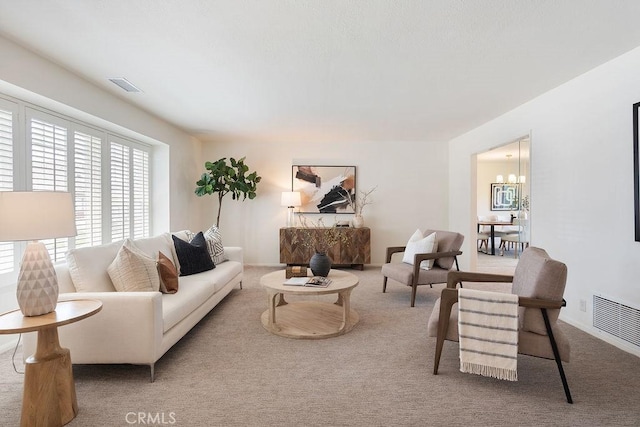 17442 Parker Dr, Tustin, CA 92780 - living room with carpet flooring, a chandelier, and baseboards