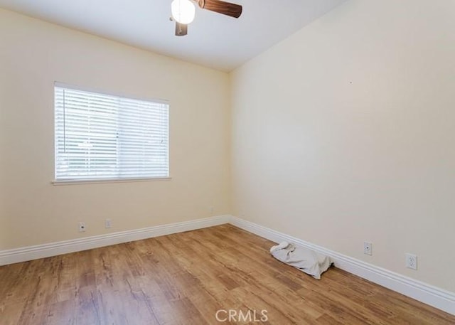 18853 Beechtree Ln, Porter Ranch, CA 91326 - empty room featuring light wood finished floors, baseboards, and ceiling fan