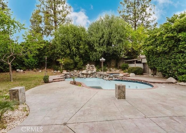18853 Beechtree Ln, Porter Ranch, CA 91326 - view of pool featuring a patio area and a pool with connected hot tub