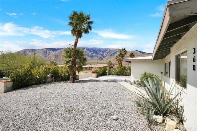 360 W Bon Air Dr, Palm Springs, CA 92262 - view of yard with a mountain view and a patio