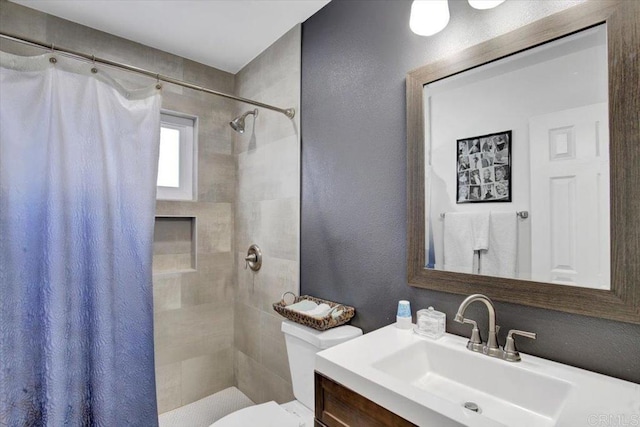 360 W Bon Air Dr, Palm Springs, CA 92262 - full bath with tiled shower, vanity, toilet, and a textured wall