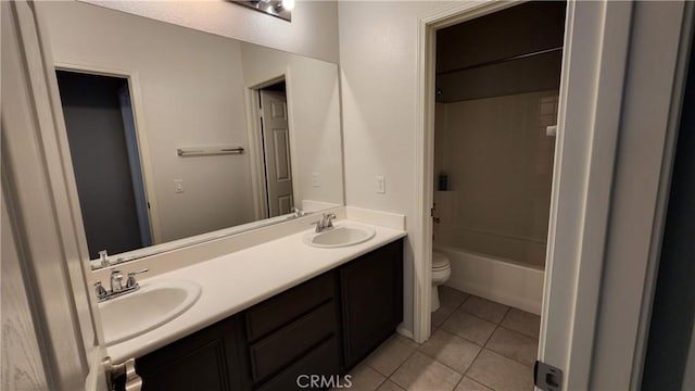 26246 Reade Pl, Stevenson Ranch, CA 91381 - full bath featuring toilet, tile patterned floors, double vanity, and bathtub / shower combination