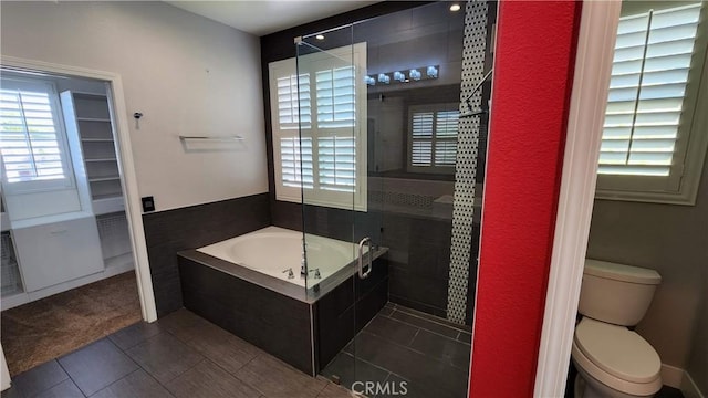 26246 Reade Pl, Stevenson Ranch, CA 91381 - full bathroom with tiled shower, a bath, tile patterned floors, and toilet