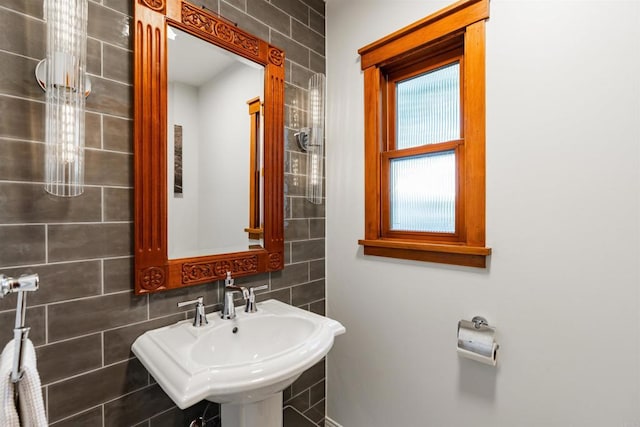 2675 Clove St, San Diego, CA 92106 - bathroom featuring a sink and tile walls