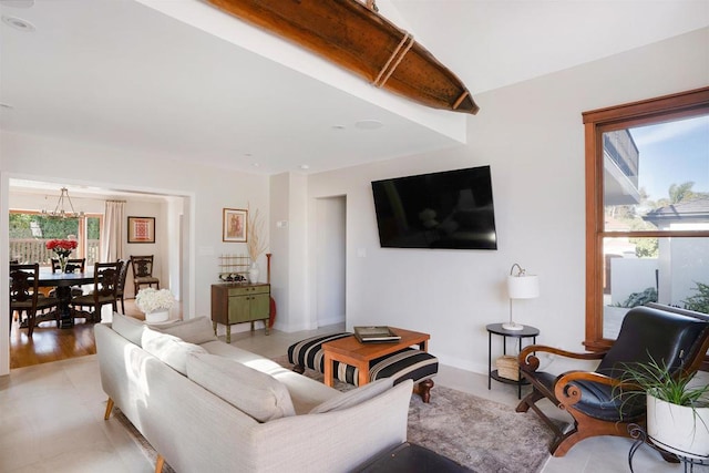 2675 Clove St, San Diego, CA 92106 - living room featuring a chandelier and baseboards
