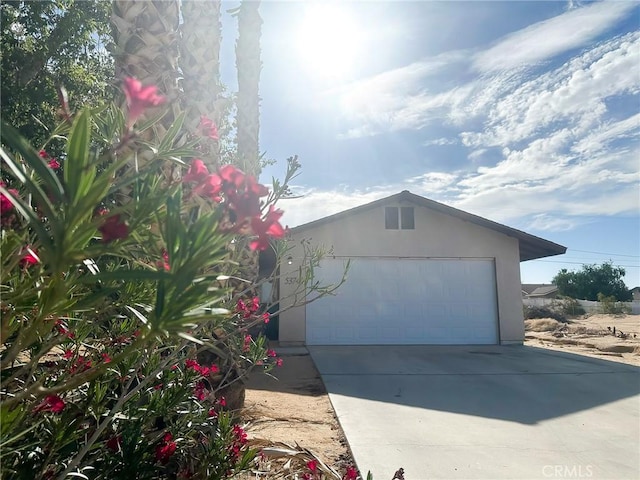 5374 Morongo Rd Unit 29, Palms, CA 92277 - garage featuring driveway