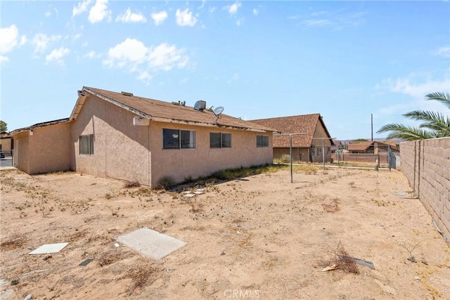 2017 Harvard Dr, Barstow, CA 92311 - back of house with stucco siding