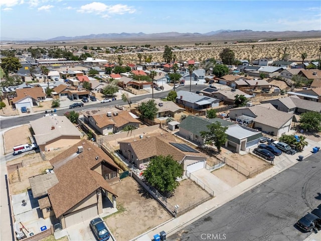 2017 Harvard Dr, Barstow, CA 92311 - aerial view of residential area with a mountain backdrop and a desert landscape