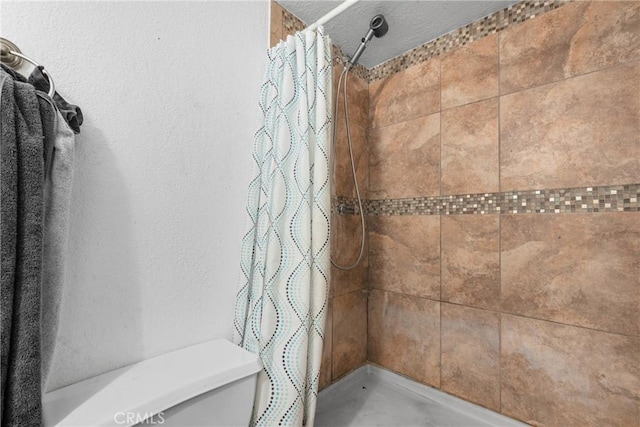 2017 Harvard Dr, Barstow, CA 92311 - bathroom with tiled shower and toilet
