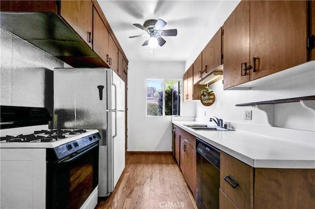 305 Raymondale Dr Unit L, South Pasadena, CA 91030 - kitchen with range with gas cooktop, dishwasher, light wood-style flooring, a ceiling fan, and light countertops